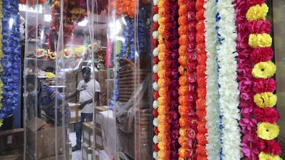 Colourful flowers and decoration items for Diwali festival on display at the shop in Bur Dubai area in Dubai. Diwali is the Indian festival of lights Pawan Singh/The National