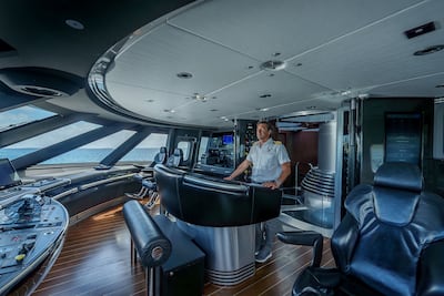 Captain Pierfrancesco Cafaro oversees navigation from the yacht’s highly advanced control system. Photo: Jumeirah