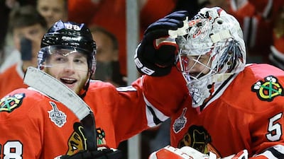 Patrick Kane, left, was a hero for the Chicago Blackhawks in Game 5 of the Stanley Cup finals. Nam Y Huh / AP Photo