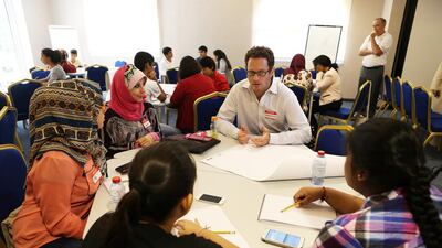 Sebastian Kraves talks to teachers and pupils during the brainstorming session.