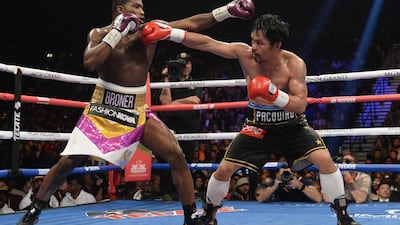 Manny Pacquiao and Adrien Broner in action. Reuters