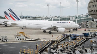 An Air France plane parked at the Charles de Gaulle International Airport's Terminal 2, in Roissy, near Paris. According to the company, some 20 per cent of flights have been cancelled in France amid a strike. EPA/Chritophe Petit Tesson/EPA