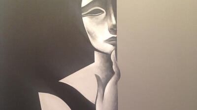 Black and white painting of a woman with her finger on her chin - Safwan Dahoul from the Dream series at Ayyam Gallery. Anna Seaman / The National
