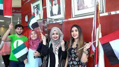 Flag Day Celebrations at Canadian University Dubai. Left to right, Layan Al Jammal, Ahmad Al Akel, Maya Al Samad and Amira Boussoufa. Victor Besa for The National