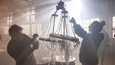 Directed by Daniel Askill, the short begins with a chandelier crashing to the floor of a dusty warehouse. Courtesy Chanel