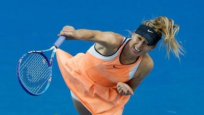 Maria Sharapova of Russia serves in her first round match against Nao Hibino of Japan during day one of the 2016 Australian Open at Melbourne Park on January 18, 2016 in Melbourne, Australia. (Photo by Darrian Traynor/Getty Images)