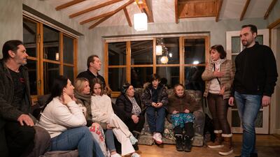 Roman Starkov, right, with his family.