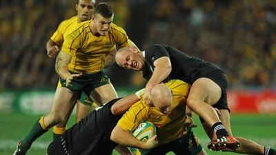 Australia's Stephen Moore is tackled during the Rugby Championship clash with New Zealand.