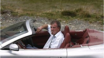 British television BBC presenter of motor show "Top Gear" Jeremy Clarkson is pictured driving an Aston Martin. Eight- to 14-year-old boys voted him the second most popular role model.