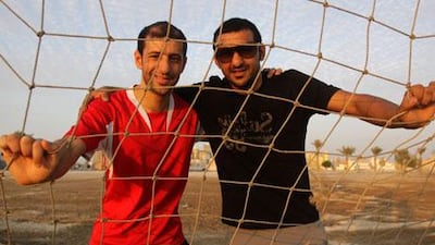 Brothers and former Bahrain national football team players Mohammed, left, and Alaa Hubail were arrested after joining peaceful protests with other athletes.