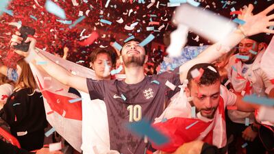 England football fans celebrate in Manchester after the win against Slovakia in the round of 16 UEFA Euro 2024 match held in Gelsenkirchen, Germany. AP