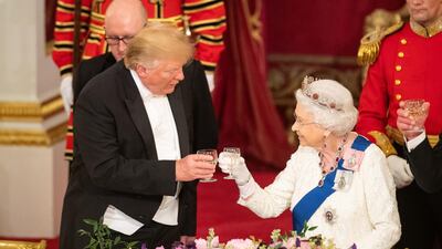 US President Donald Trump and Queen Elizabeth II make a toast during a State Banquet at Buckingham Palace in London, England. Getty Images