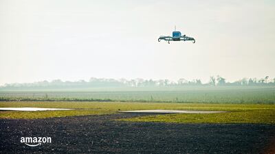 An Amazon Prime Air drone in Cambridgeshire, UK. E-commerce companies have long explored the prospect of deploying drones for deliveries on a large scale. AP file
