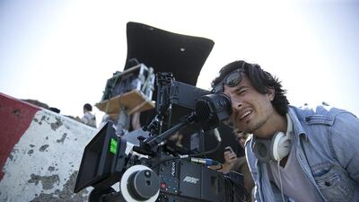 Ali Mostafa on the Abu Dhabi corniche while filming From A to B. Silvia Razgova / The National