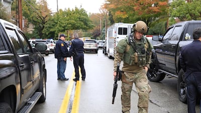 A SWAT police officer and other first responders at the scene after a gunman opened fire at the Tree of Life synagogue. Reuters