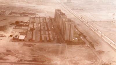 An aerial shot of the Sheikh Zayed Road in Dubai in the 1980s. The Trade Centre apartments, also often known as the Hilton apartments after the hotel that once sat beside them, dominate the image. All photos: Richard Parry unless stated.