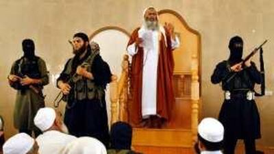 On the last day of his life, Abdel Latif Mousa, centre, speaks during Friday prayers in Rafah.