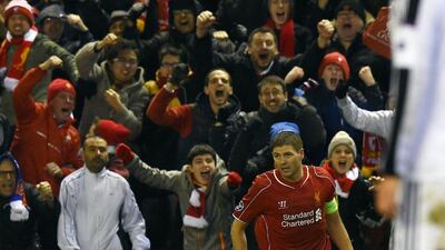 Liverpool's Steven Gerrard celebrates his goal, briefly giving his club's Champions League life some hope, on Tuesday against Basel. Paul Ellis / AFP