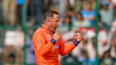 Netherlands' Roelof Van Der Merwe celebrates after bowling out India's Virat Kohli. AP