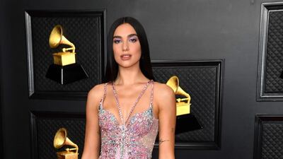 British singer-songwriter Dua Lipa, one of the performers of the night, kept it glamorous in a glittering Atelier Versace gown. AFP