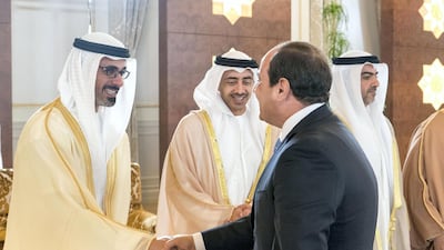 Major General Sheikh Khaled bin Mohammed bin Zayed, Deputy National Security Adviser (L), greets Abdel Fattah El Sisi, President of Egypt (R), during a reception at the Presidential Airport. They are seen with Sheikh Abdullah bin Zayed, UAE Minister of Foreign Affairs and International Cooperation (C) and Sheikh Hamed bin Zayed, Chairman of the Crown Prince Court of Abu Dhabi and Abu Dhabi Executive Council Member (back R). Rashed Al Mansoori / Crown Prince Court - Abu Dhabi