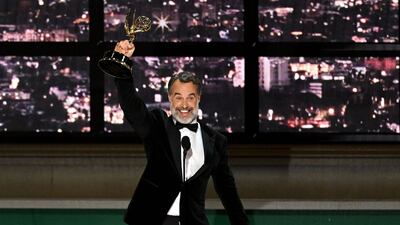 Murray Bartlett accepts the award for Outstanding Supporting Actor In A Limited Or Anthology Series Or Movie for 'The White Lotus'. AFP