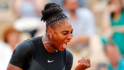 Serena Williams celebrates winning a point against Julia Georges during their third round match at the French Open. Christophe Ena / AP Photo