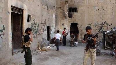 Free Syrian Army fighters prepare for an offensive against forces loyal to President Bashar Al Assad in Deir Al Zor on Thursday. Khalil Ashawi / Reuters