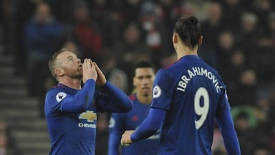 Wayne Rooney celebrates his equalising goal against Stoke City — a goal that made him Manchester United’s all-time leading goalscorer. Rui Vieira / AP Photo