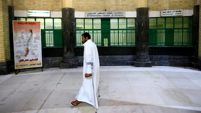 A passenger walks inside Baghdad's central railway station. Reuters