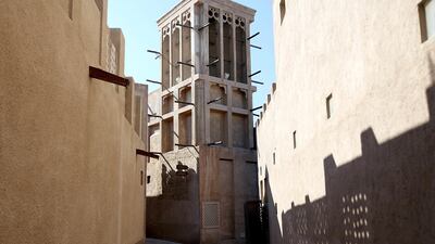 The Bastakiya district in Dubai with its narrow lanes and tall wind-towers gives a glimpse of old Dubai. Rich-Joseph Facun / The National