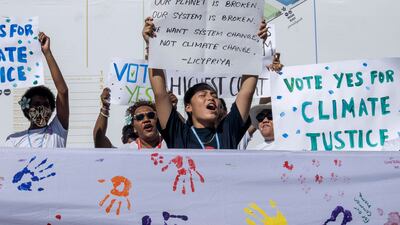 Students from the Pacific Islands stage a climate protest at the summit. AP Photo