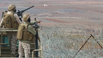 Jordanian soldiers patrol the border with Syria. AFP