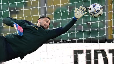 Gianluigi Donnarumma makes a save. Getty Images