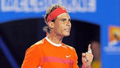 Rafael Nadal of Spain celebrates winning his match against Philipp Kohlschreiber of Germany on day five of the Australian Open.