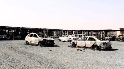 Seventeen cars were destroyed by angry workers after one of their colleagues fell to his death from a building under construction. Wam