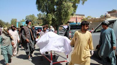 People shift the bodies of their relatives who were killed in an air raid and ground assault on a Taliban hideout by Afghan special forces, in Helmand, Afghanistan, September 23, 2019. EPA/WATAN YAR
