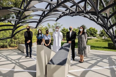 Sheikh Sultan bin Ahmed Al Qasimi, American University of Sharjah chancellor Kevin Mitchell, Arada head of brand Melissa Bayik, AUS professor George Katodrytis and two students at the pavilion. Courtesy Arada