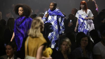 Models present creations at the Burberry catwalk show during London Fashion Week. Reuters