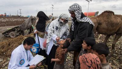 Children are immunised in Pakistan as part of the polio campaign supported by the Emirates. Wam