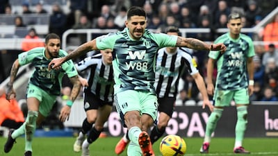 Fulham striker Aleksandar Mitrovic of Fulham scores a penalty, which was disallowed after a double-touch on the ball from the Serbian. AFP