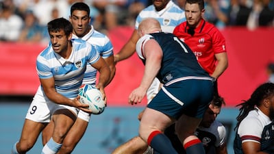 Argentina's scrum-half Felipe Ezcurra (L) looks to pass the ball during the Japan 2019 Rugby World Cup Pool C match between Argentina and the United States at the Kumagaya Rugby Stadium in Kumagaya. AFP