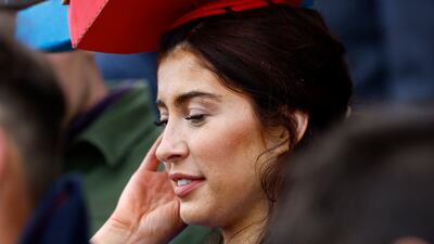 The Cheltenham Festival continued on Wednesday, with one race goer styled pizza boxes as a hat. Reuters
