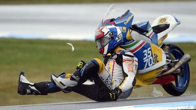 3570 Team Italia’s Italian rider Lorenzo Petrarca crashes out during the first practice session of the Moto 3 ahead of 2016 Australian Grand Prix at Phillip Island. Saeed Khan / EPA
