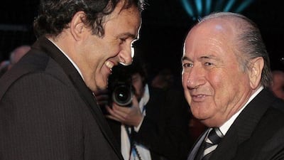 Fifa president Sepp Blatter, right, speaks with Uefa president Michel Platini, left, during the 57th Fifa congress at the Hallenstadion in Zurich, Switzerland in 2007. Eddy Risch/Keystone