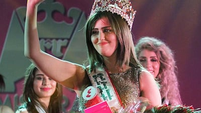 Iraqi Shaymaa Qasim from Kirkuk waves after winning the Miss Iraq beauty contest on December 19, 2015 in the capital Baghdad. Ahmad Al Rubaye/AFP Photo