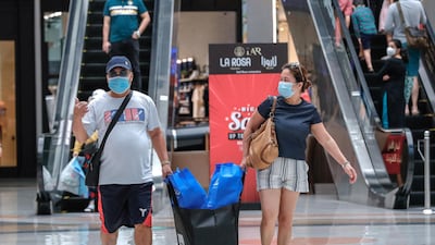 Shoppers at Al Wahda Mall in Abu Dhabi, on the last day of Eid Al Adha, in August 2020. Victor Besa /The National