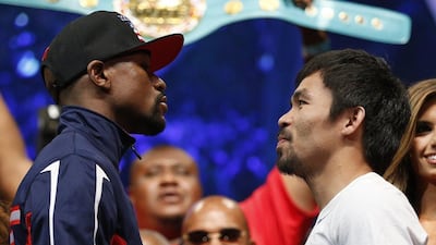 Floyd Mayweather and Manny Pacquiao square off for a second time this September on Netflix. AP