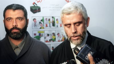 Two members of the hardline Palestinian group Hamas, Ismail Haniyeh, left, and Khalid Al-Hindi after they registered as candidates in the central election office, in Gaza city, December 1995. AFP