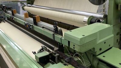 The machine produces cotton textiles in two kinds. The first will be used in the inner lining of the kiswah, and the other, which is white, is used to cover the Kaaba during the Hajj season when the kiswah is pulled up.